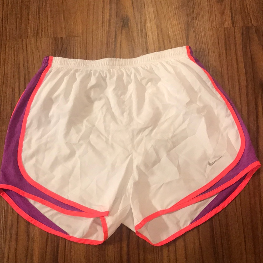 Bright white neon pink and neon purple Nike shorts